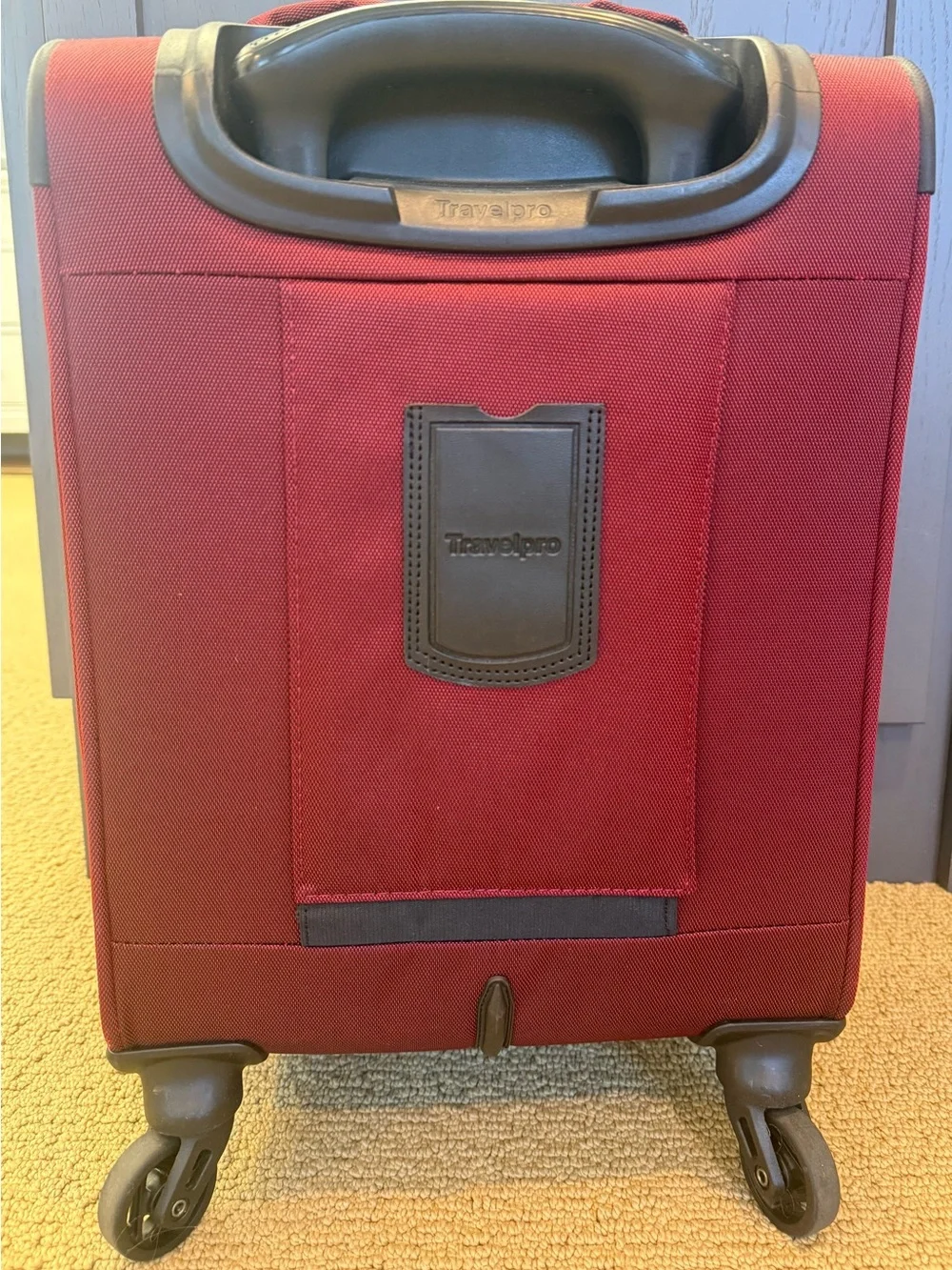 TravelPro Red Carry-On Spinner Bag Luggage
